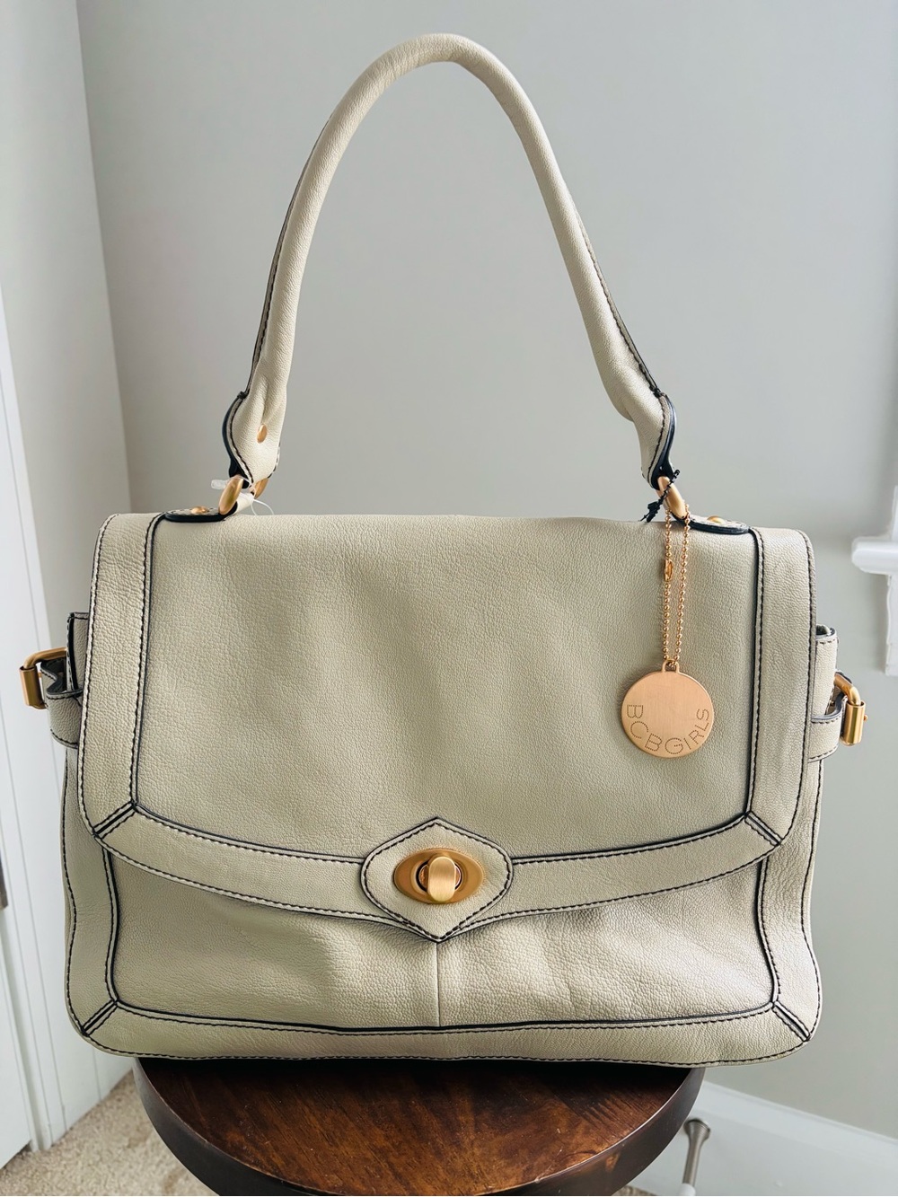 BCBGirls Cream Satchel with Gold Charm